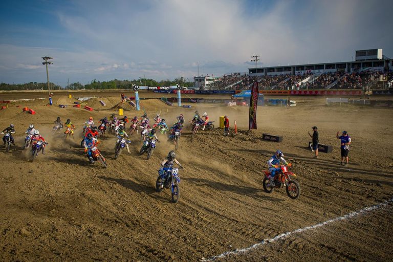 Riders turning around the first corner at round 1 of the 2023 Triple Crown Series.
