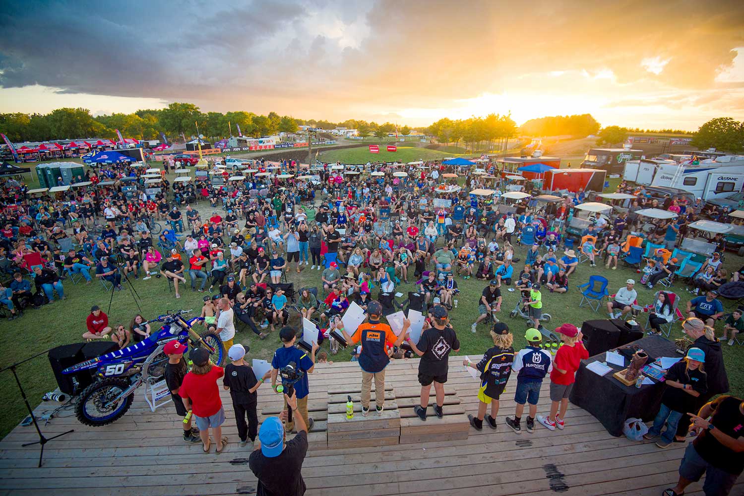 The podium and crowd at a motocross race.