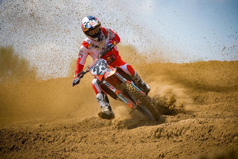 KTM Canada Red Bull's Josiah Natzke makes a large rooster tail at Gopher Dunes.